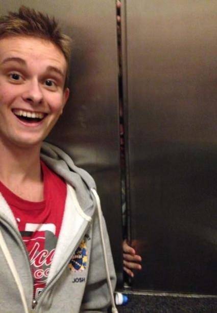 Taking a selfie with people trapped in the elevator